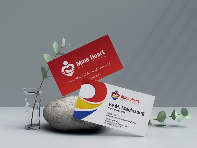 Clean minimal business card mockup floating on top table with leaves background. PSD file.
